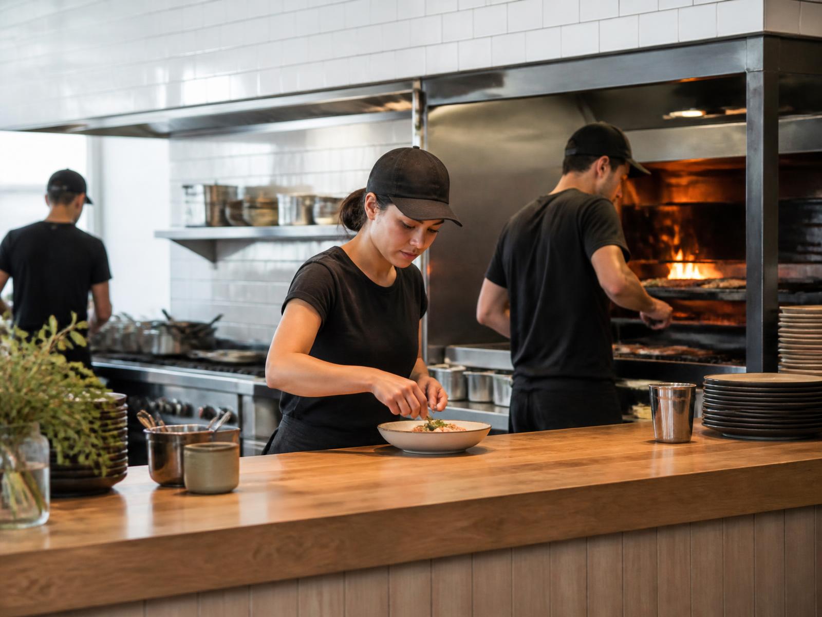 BRAVA team working the open kitchen